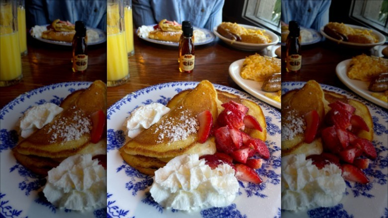 Strawberry cheesecake stuffed pancakes on a plate