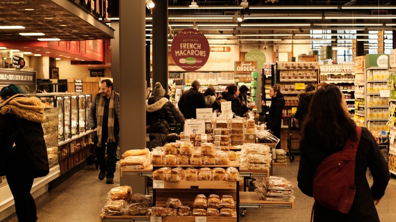 People shopping inside Whole Foods