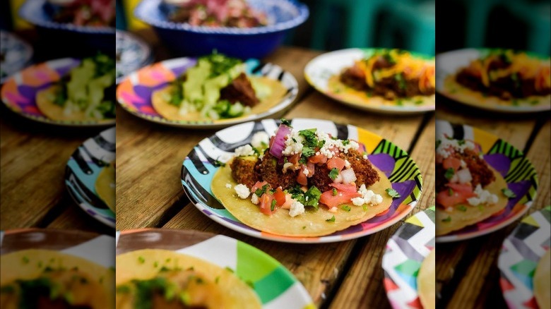 colorful plates of tacos