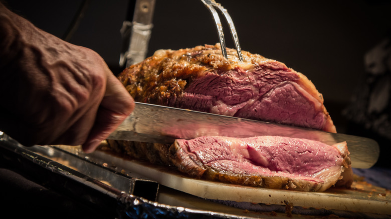 Prime rib being sliced