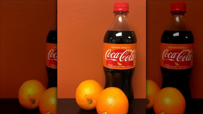 Orange Vanilla Coke bottle and oranges