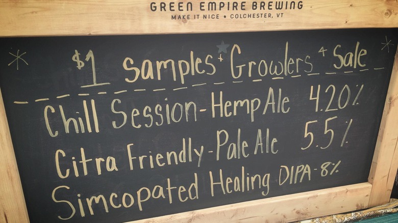 Green Empire Brewing wooden beer menu sign