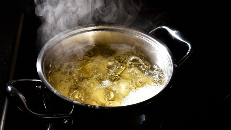 Potatoes boiling on the stove