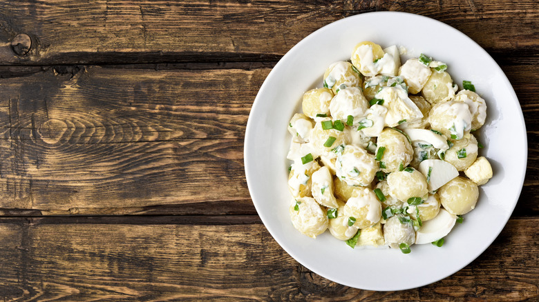 Potato salad on table