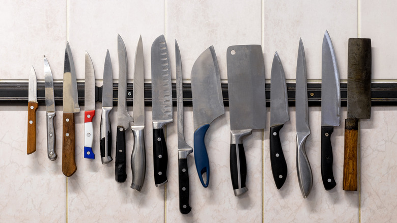 knives hanging on magnetic rack