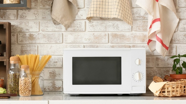 Microwave oven in stylish kitchen