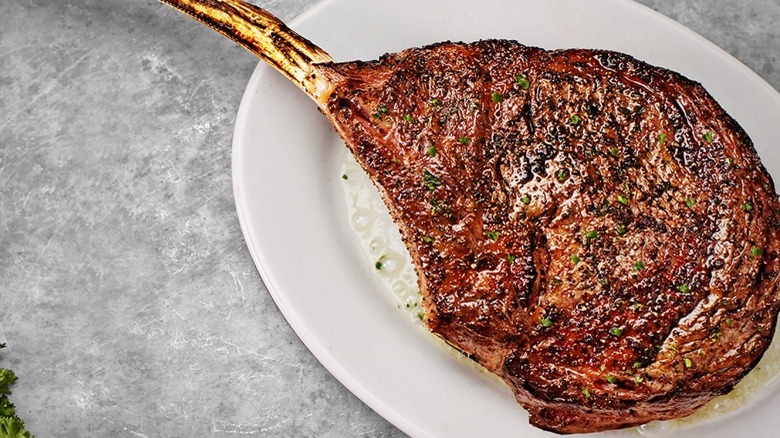 tomahawk steak on plate