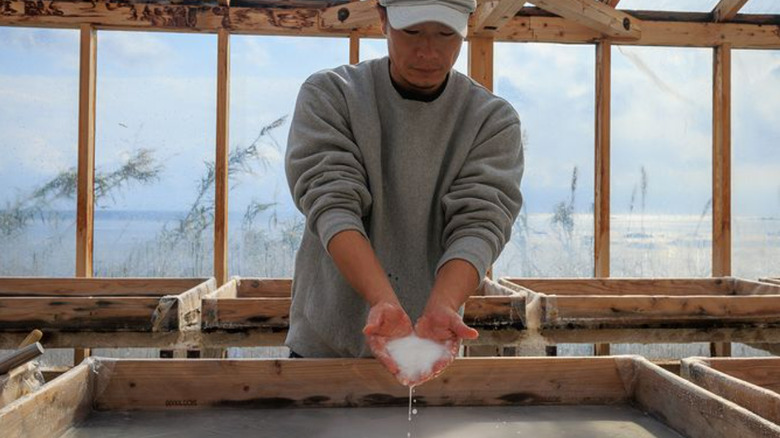 A Japanese man making salt