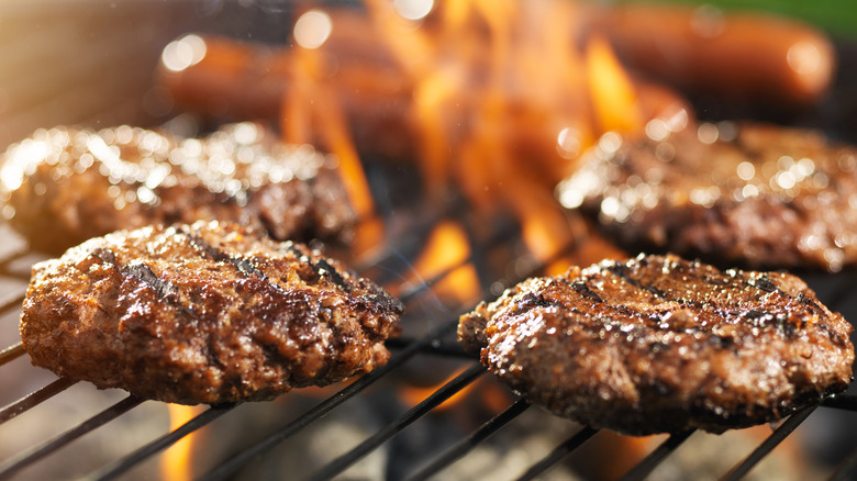 Steak burgers on grill