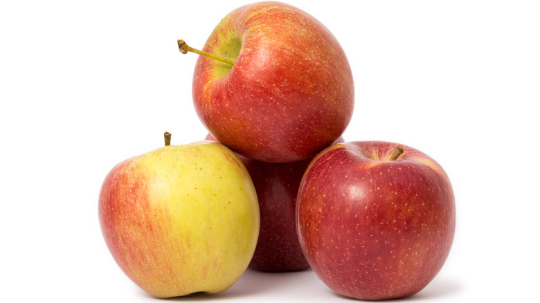 Braeburn apples on white background