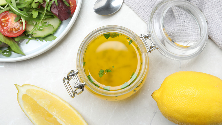 Lemon vinaigrette on white background