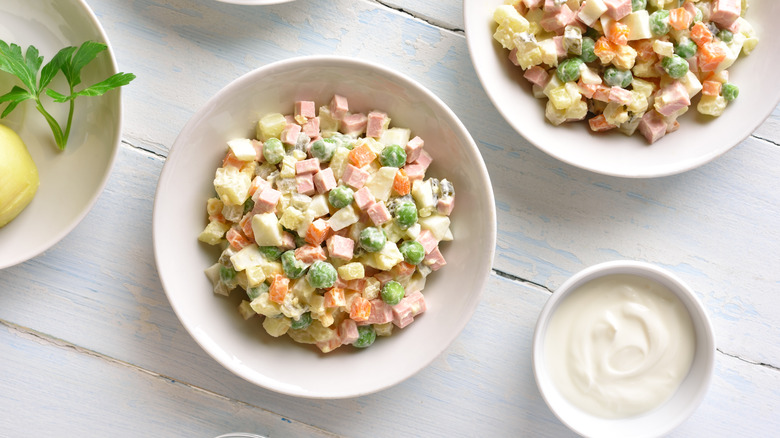 Russian salad Olivier in bowls