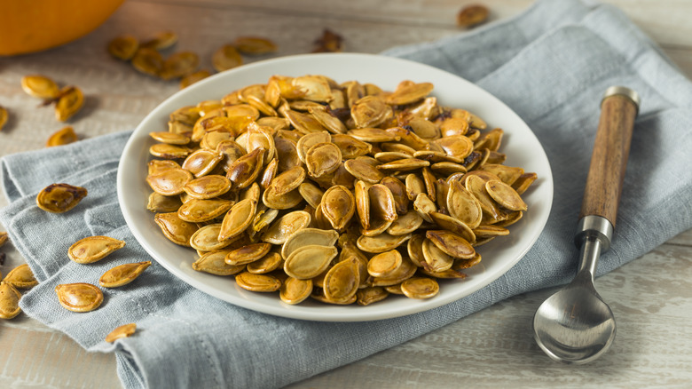 bowl of roasted pumpkin seeds