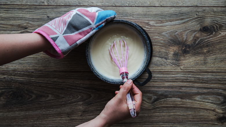 whisking Bechamel sauce