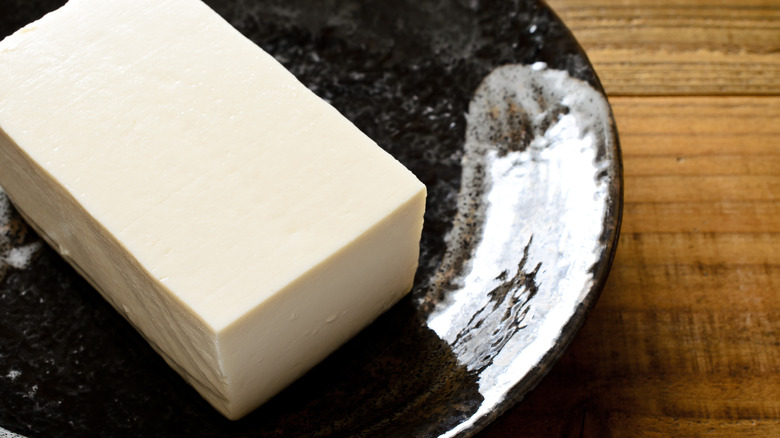 Silken tofu in black bowl