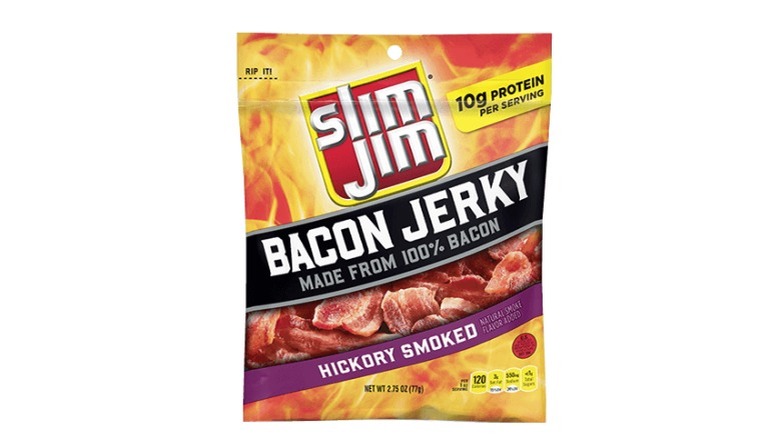 A bag of Slim Jim bacon jerky against a white background