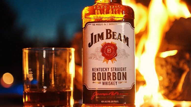 Jim Beam by a bonfire