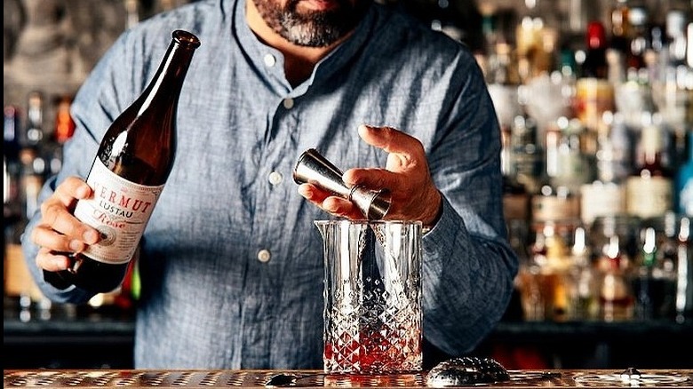 Bartender making cocktail