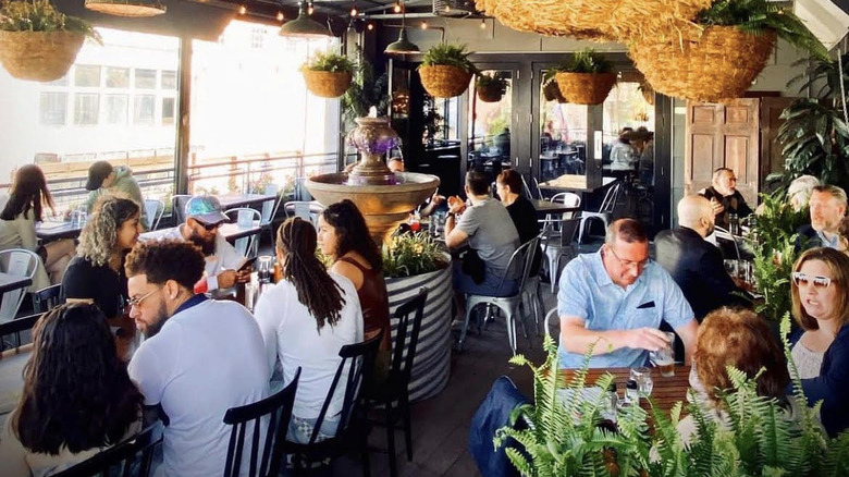 Customers in rooftop restaurant