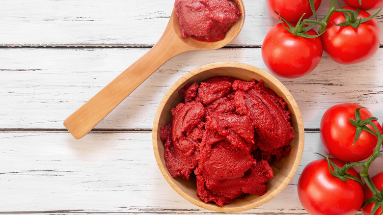 Tomato paste in wood bowl