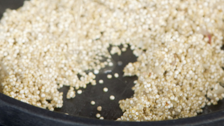 Quinoa toasting in pan