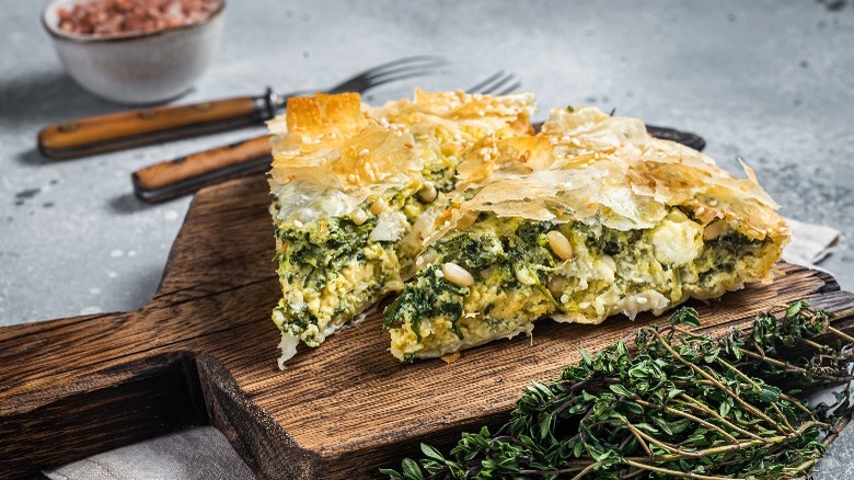 Spanakopita on a cutting board