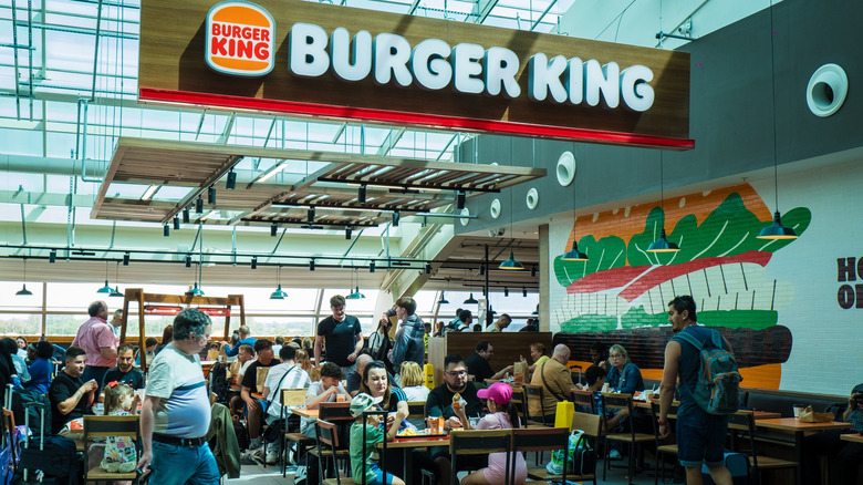 Diners at an airport Burger King