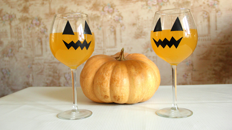 Halloween themed drinks with pumpkin