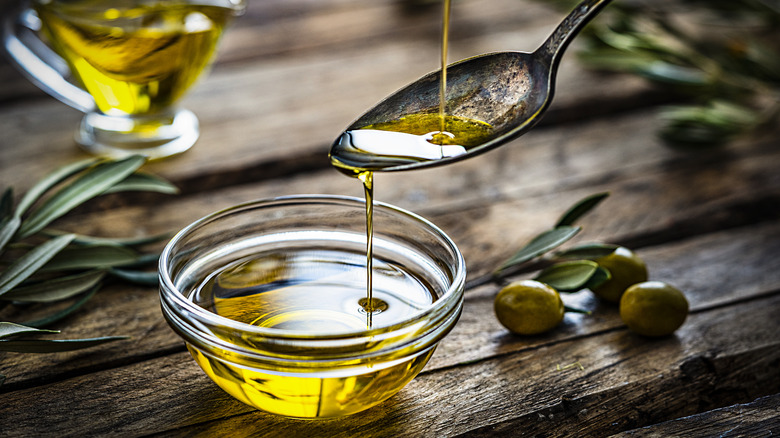 Olive oil dish on table