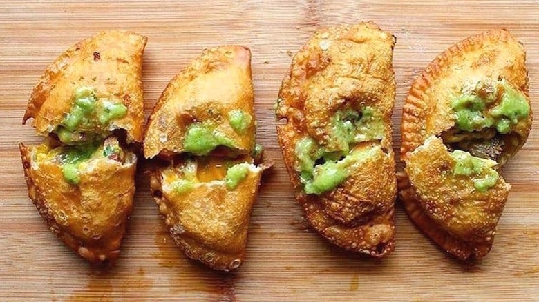 Four split empanadas