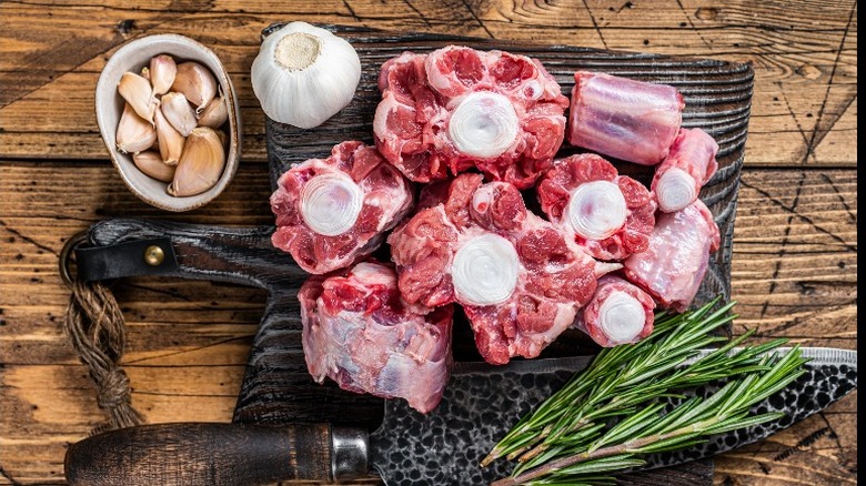 Oxtail ingredients on wood