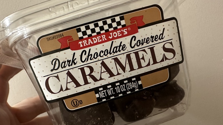 container of dark chocolate caramels