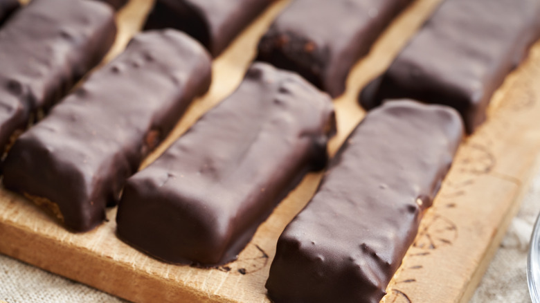 homemade chocolate bars on wood board