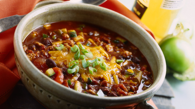 Bowl of chili topped with cheese