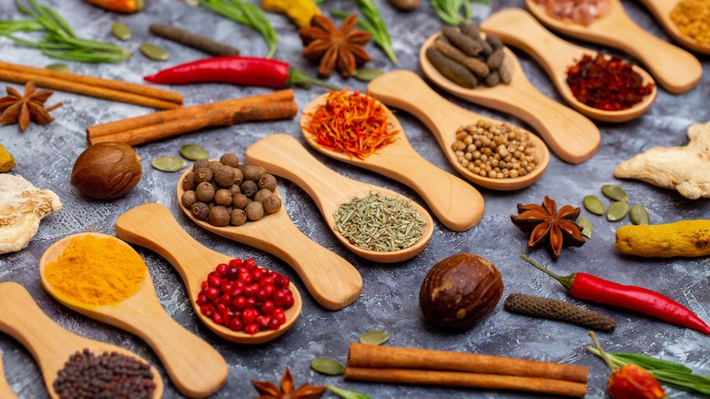 spices in wooden spoons