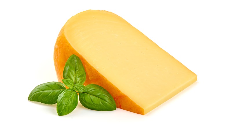 Gouda cheese with fresh basil