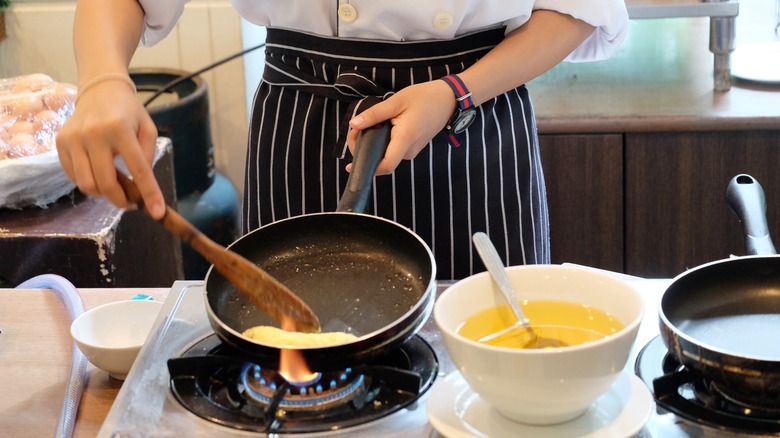 chef making omelet at buffet