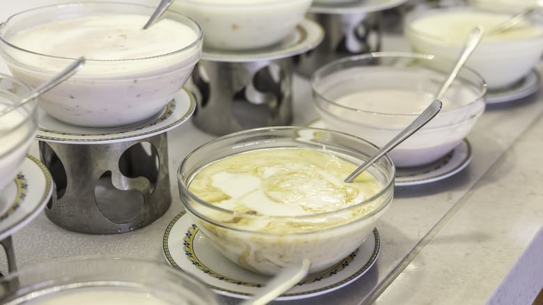 bowls of yogurt on buffet