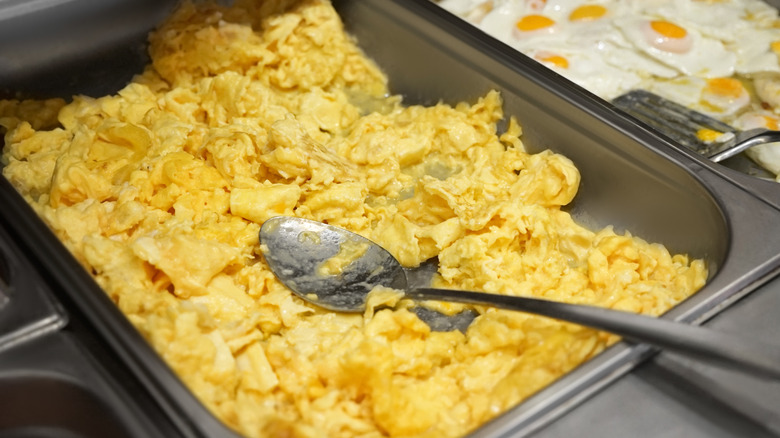 buffet container of scrambled eggs