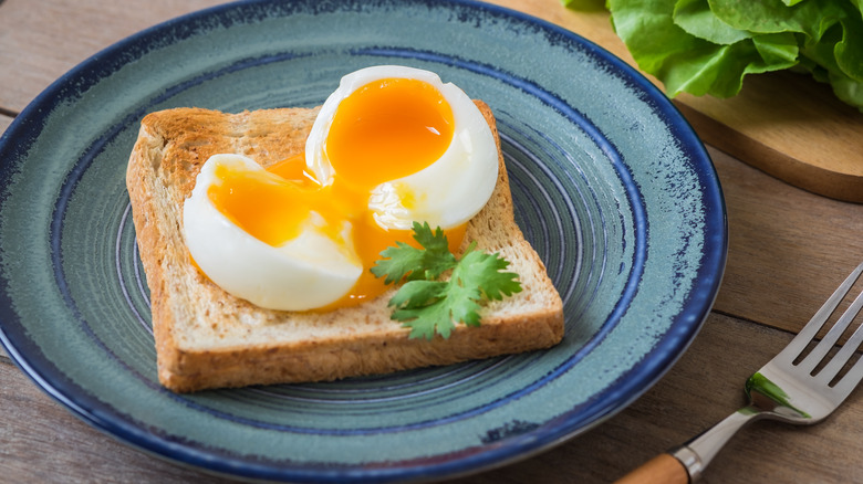 Soft cooked egg on toast