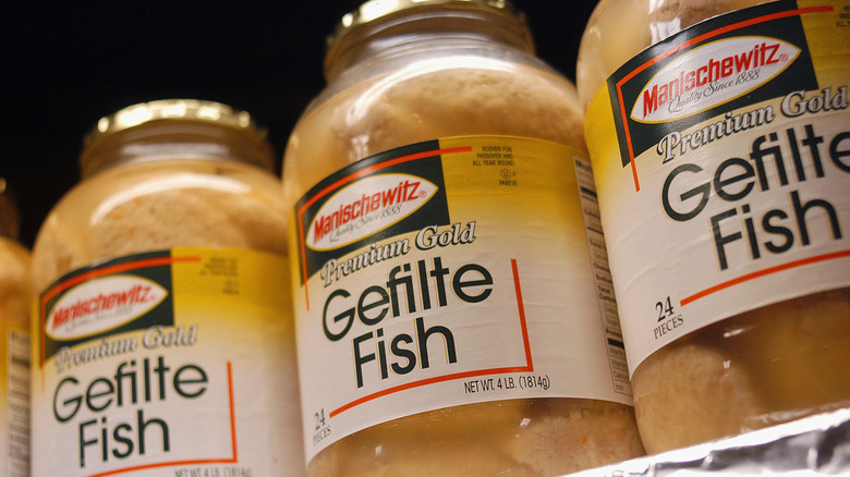 Jars of gefilte fish on store shelf