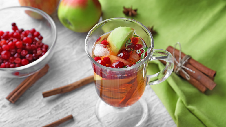 iced apple cider with cranberries