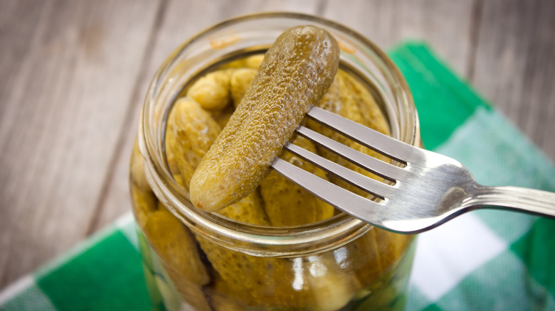 fork with pickle coming out of pickle jar