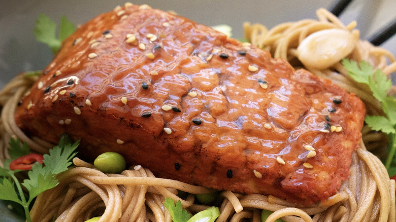 Revo Foods 3-D printed vegan salmon over noodles