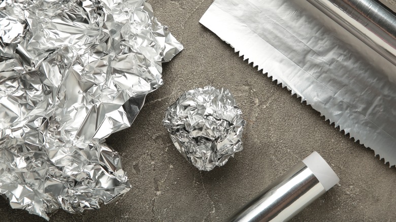 aluminum foil scrunched into ball