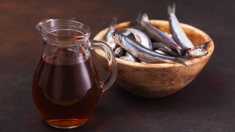 Sauce pitcher and bowl of anchovies