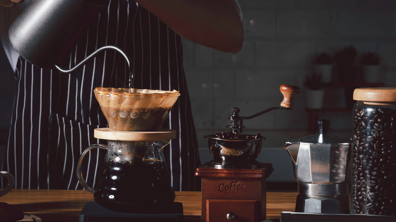 Person pouring coffee