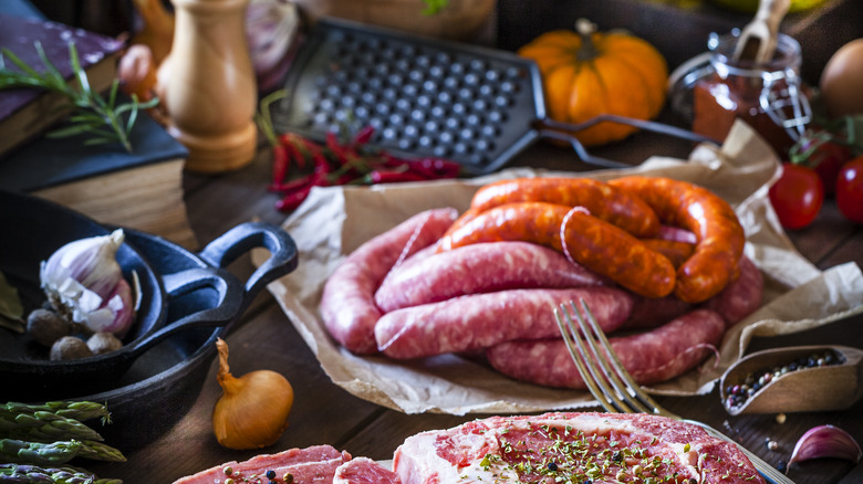 plate of various sausages on table