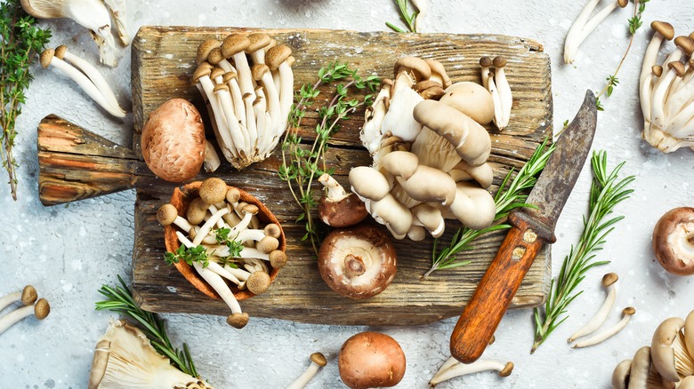 Mushrooms laying on a board