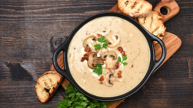 soup with bread on table